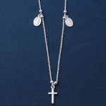 sterling silver high polish cross and charms necklace